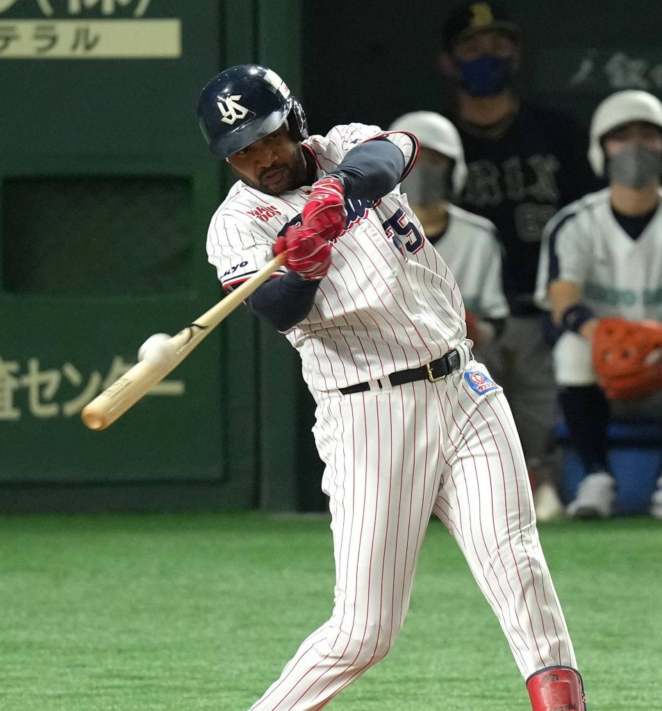 Adam Jones of the Orix Buffaloes hits a solo home run in the ninth inning  of Game 5 of the Japan Series against the Yakult Swallows at Tokyo Dome on  Nov. 25