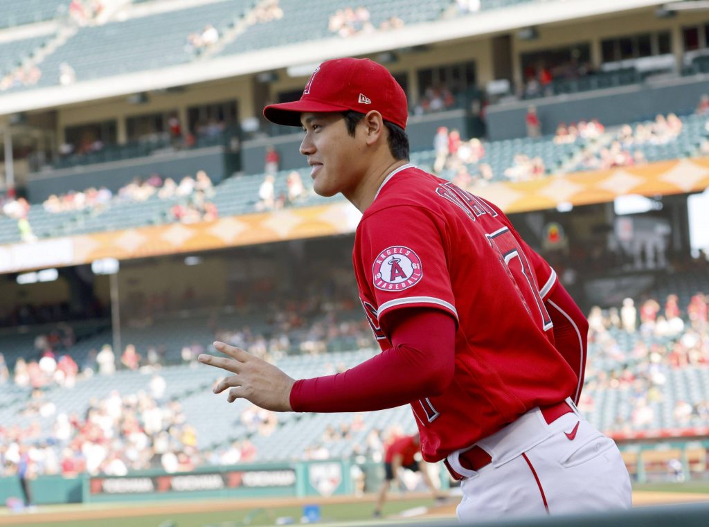 Mike Trout of the Los Angeles Angels prepares to put on a samurai