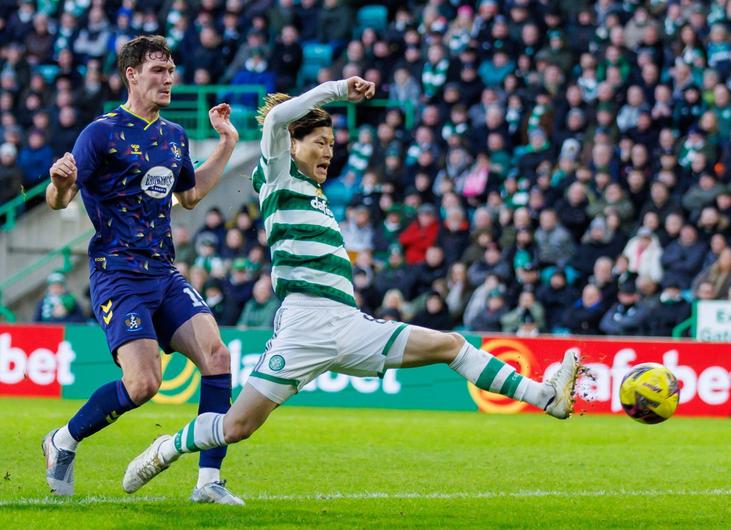 Glasgow, UK. 26th Feb, 2023. CelticÕs Japanese players Tomoki Iwata and  Yuki Kobayashi flank Kyogo Furuhashi after the The Scottish League Cup  match at Hampden Park, Glasgow. Picture credit should read: Neil