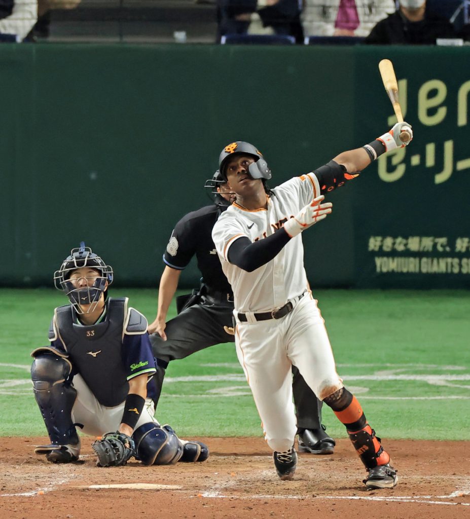 Hideki Matsui, former MLB Yankees and Tokyo Yomiuri Giants player throws  out the ceremonial first pitch prior to the game between the Yomiuri Giants  and the Yakult Swallows at Tokyo Dome on