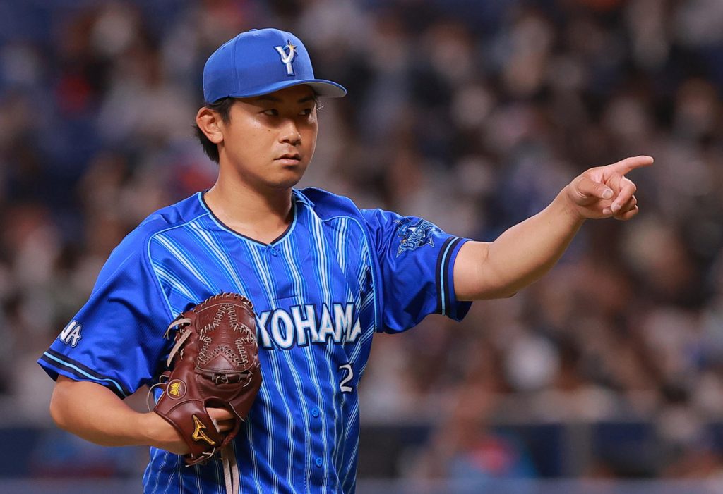 Hideki Matsui, former MLB Yankees and Tokyo Yomiuri Giants player throws  out the ceremonial first pitch prior to the game between the Yomiuri Giants  and the Yakult Swallows at Tokyo Dome on