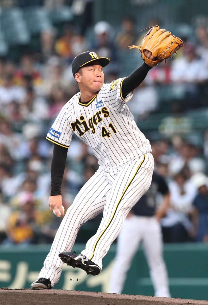 Man and girl at Hanshin Tigers baseball game Koshien stadium