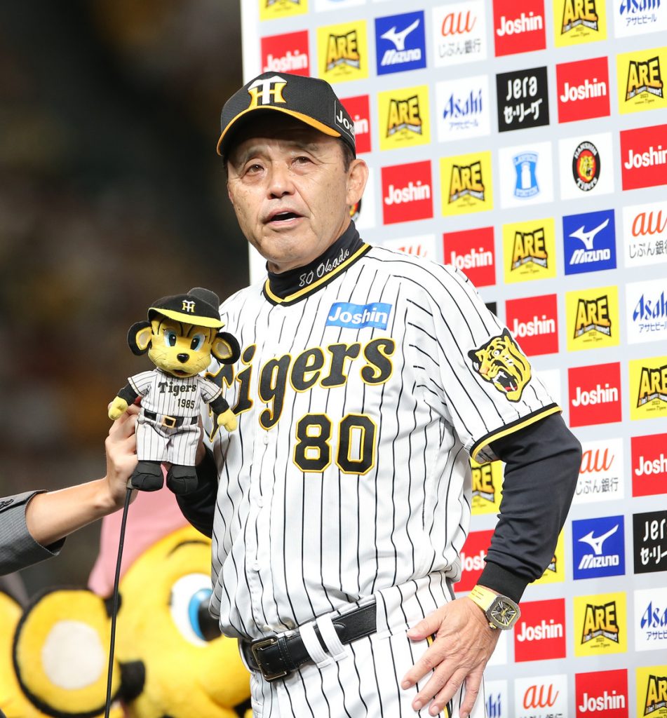 A player of the Hanshin Tigers' new women's team takes batting